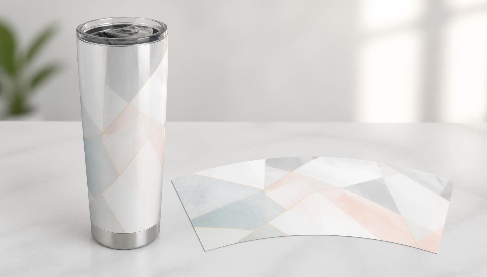 20oz skinny tumbler next to a flat arc-shaped sublimation wrap template sheet